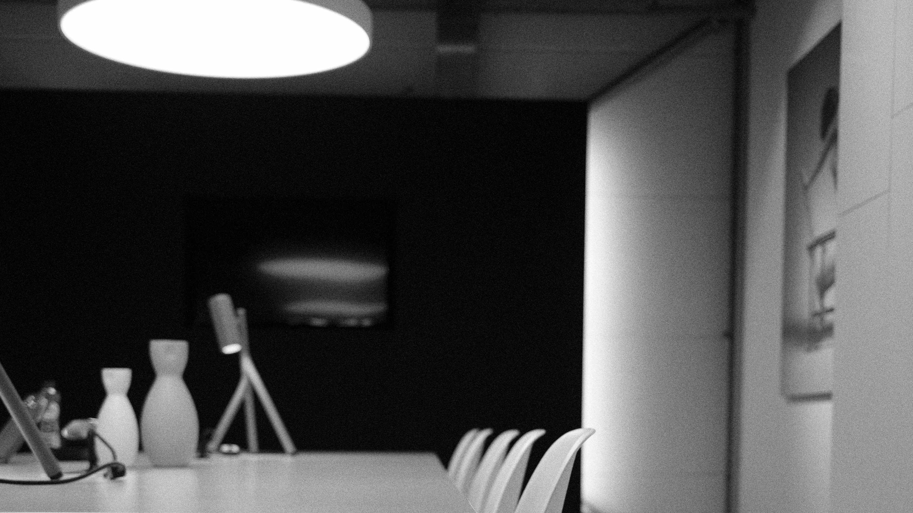 Modern workspace with Acosorb modular acoustic panels in black and white